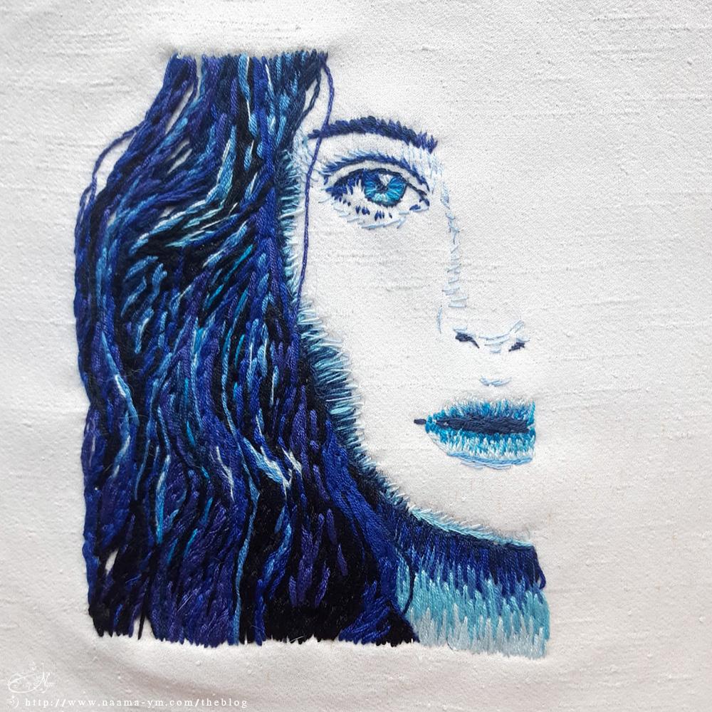 פורטרט רקום בחוטים בצבעי כחול